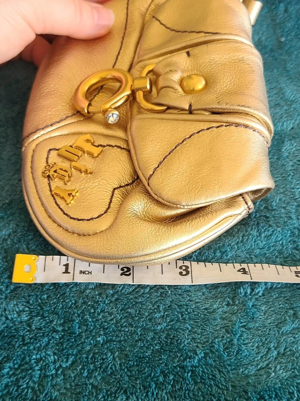 Y2K vintage metallic gold leather Juicy Couture wristlet featuring Heart Accent